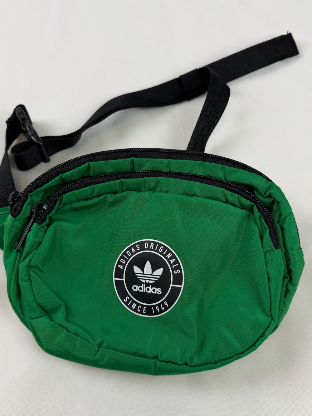 adidas Originals green waist bag with black strap